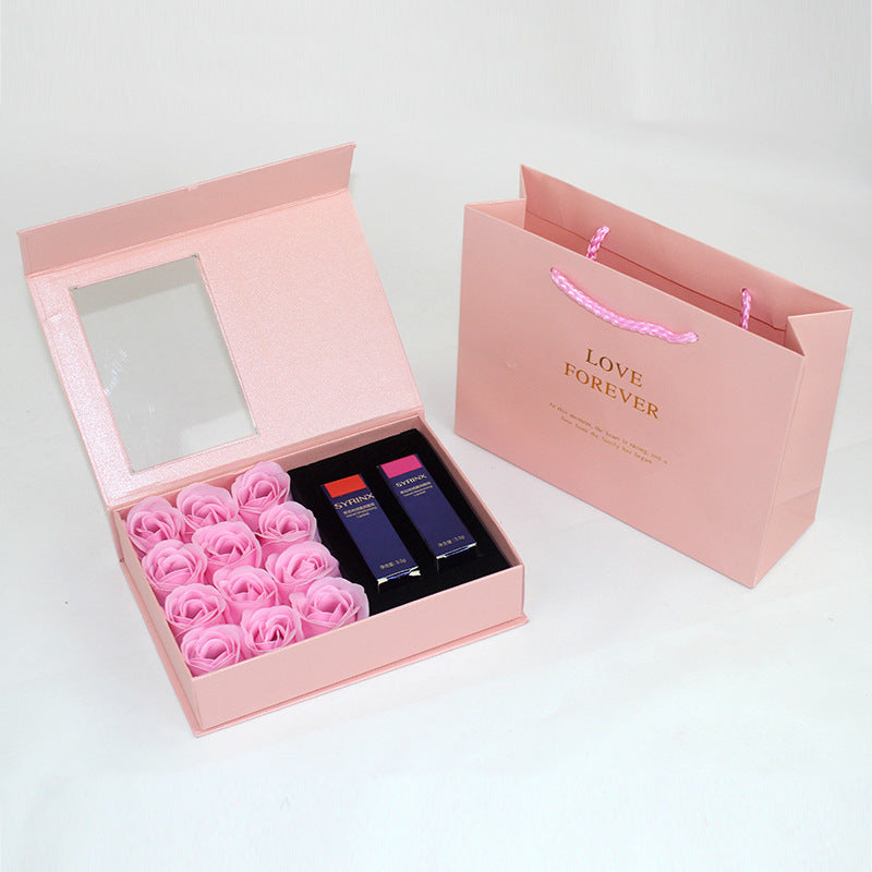 Gift box jewelry and lipstick with roses