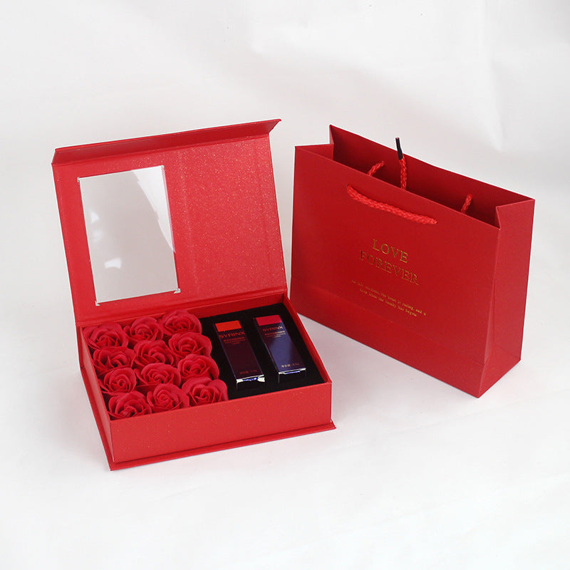 Gift box jewelry and lipstick with roses