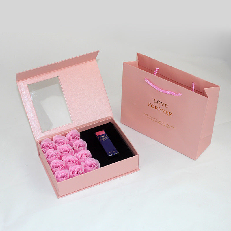 Gift box jewelry and lipstick with roses